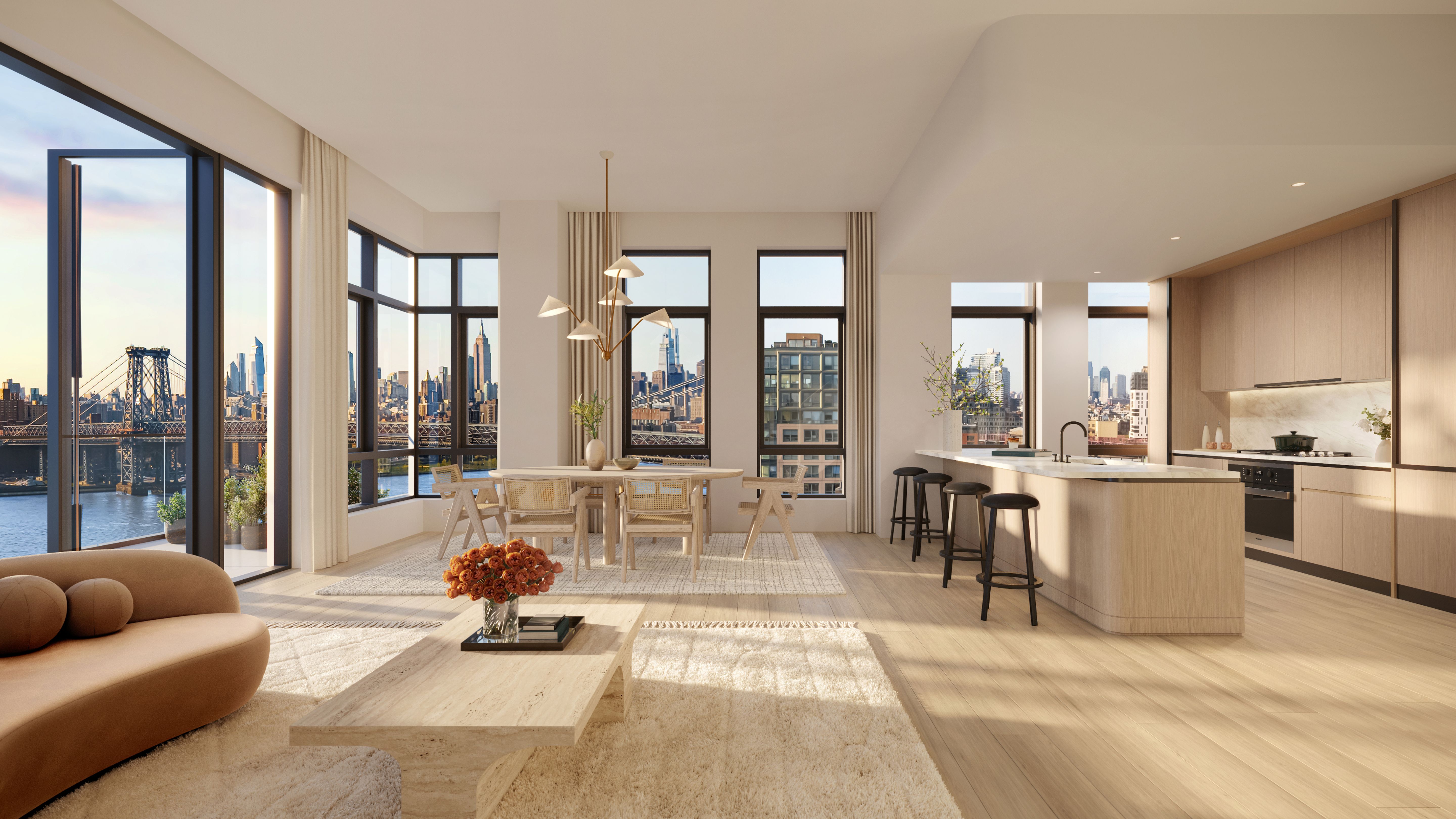 Open concept living and dining area in a luxury Williamsburg penthouse at One Williamsburg Wharf, with modern kitchen, large windows, and city views.